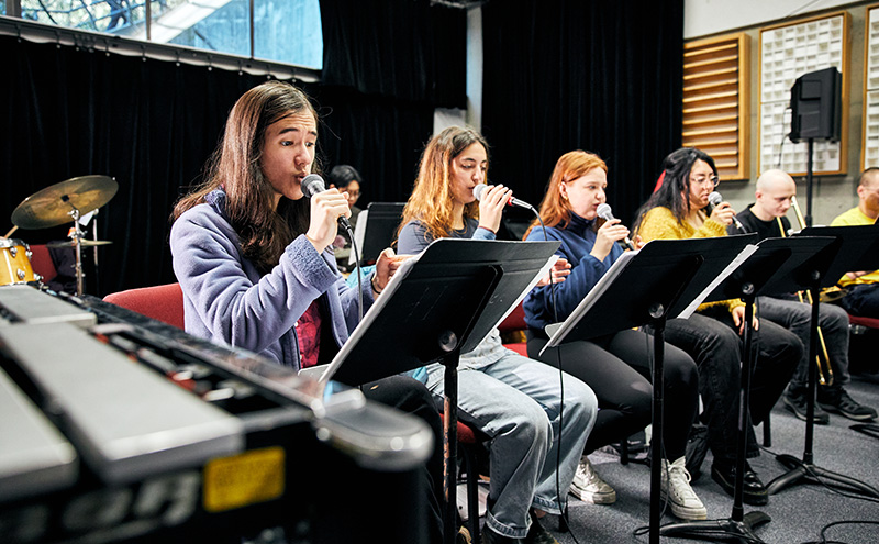 Student singers in classroom