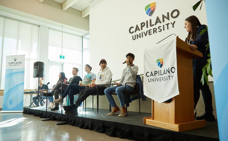 Student ambassadors talk with prospective students at the Explore CapU Open House.