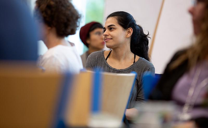Student listening to presentation
