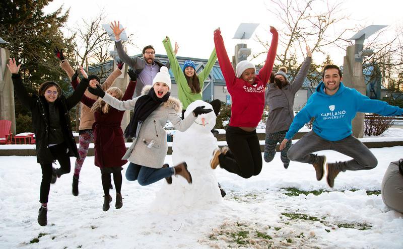 Student Affairs team jumping outside